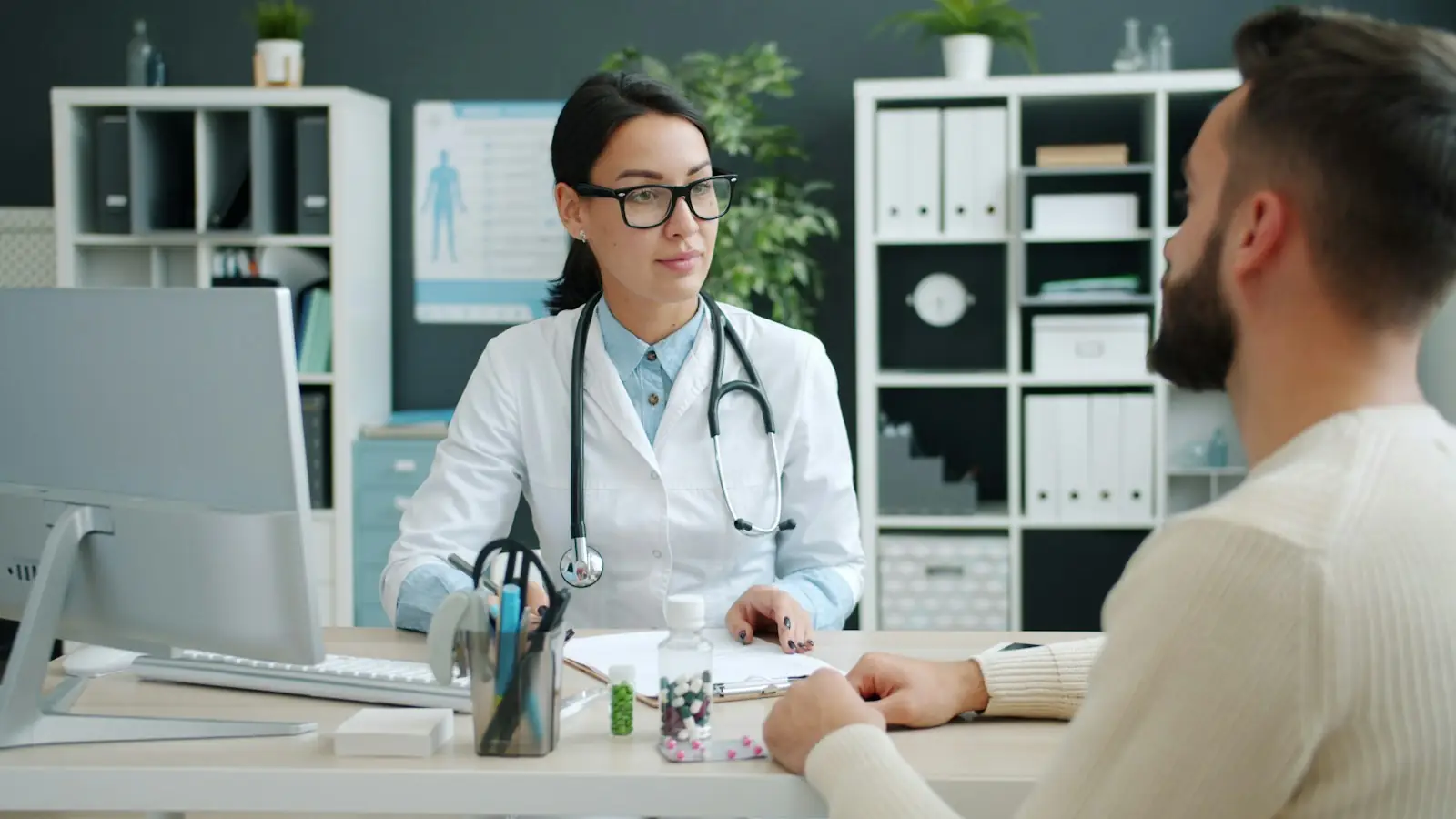 A doctor consulting with a patient in a medical office